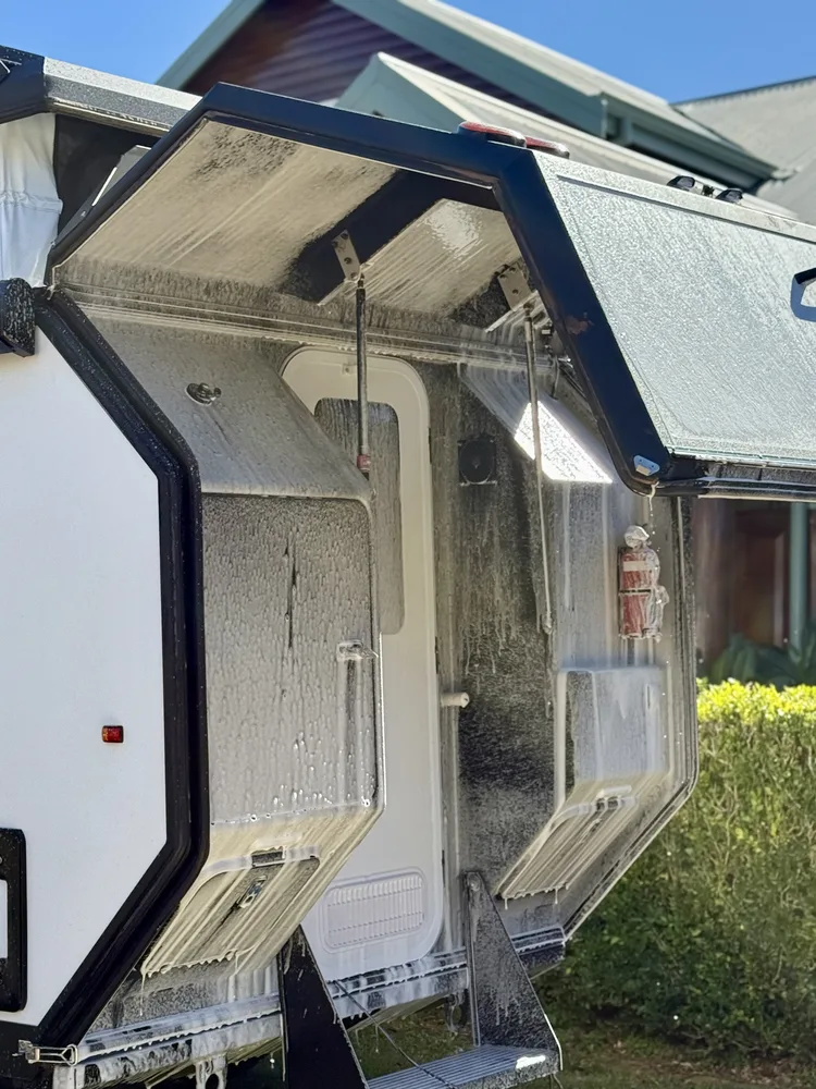 Camper trailer roof and hatch mid-wash, foam rinse, Perth