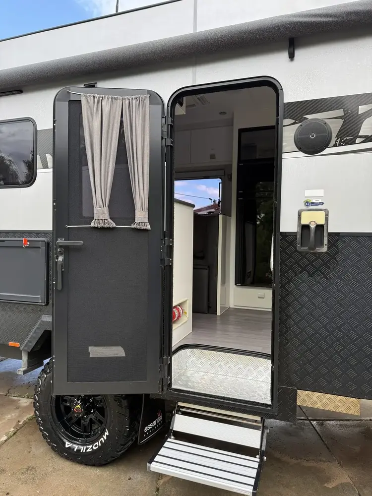 Caravan door open on-site, mobile detailing Perth